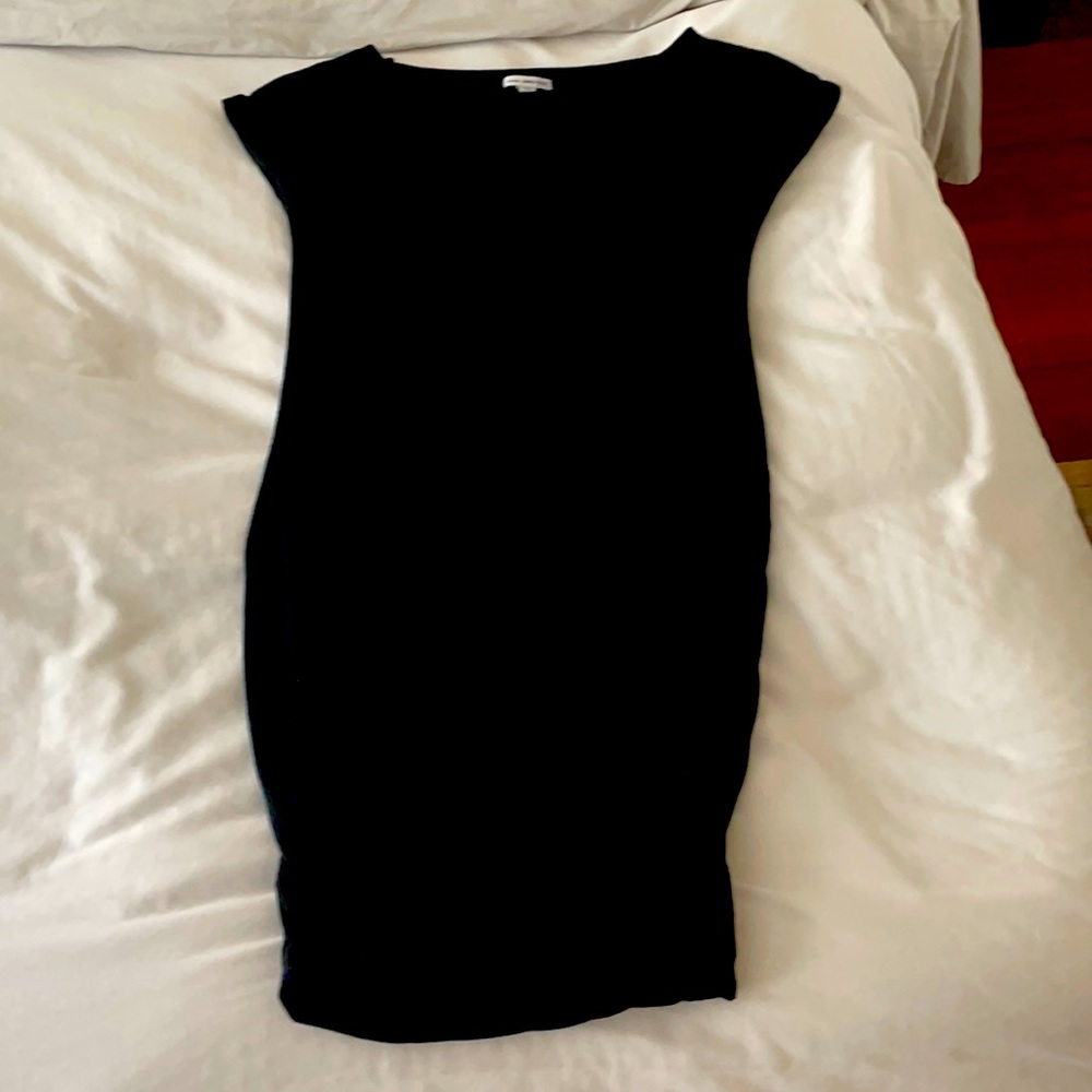 Black James Peres off the shoulder dress.